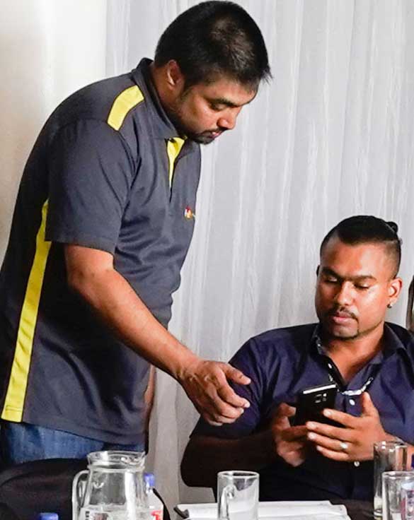 Sunil Sewpersadh assisting a training delegate